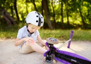 A child is hurt after falling off their bike