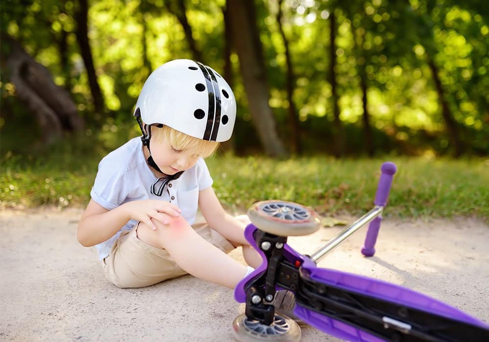 A child is hurt after falling off their bike