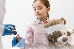 a girl gets her diabetes checked