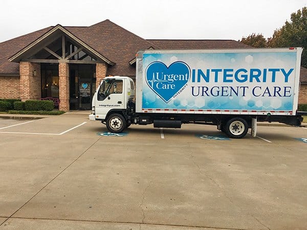 An Integrity truck pulls up to a clinic