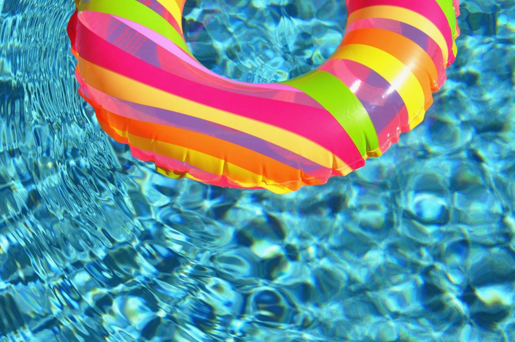 A floatie floats in a pool