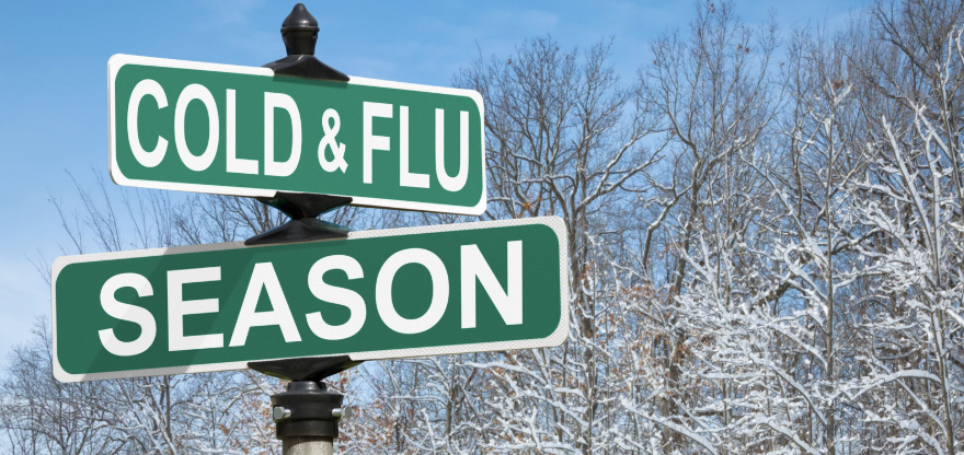 A photo of a sign that says "cold and flu season"