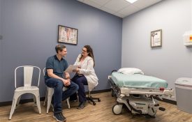 a doctor speaks to a patient