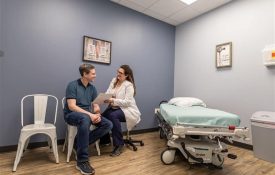 a doctor speaks to a patient
